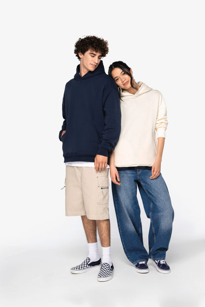 Unisex oversized organinės medvilnės džemperis su gobtuvu — naturalusdrabuziai.lt