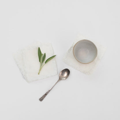 Optical White lino padėkliukai su kutais rinkinys 4 vnt. — naturalusdrabuziai.lt